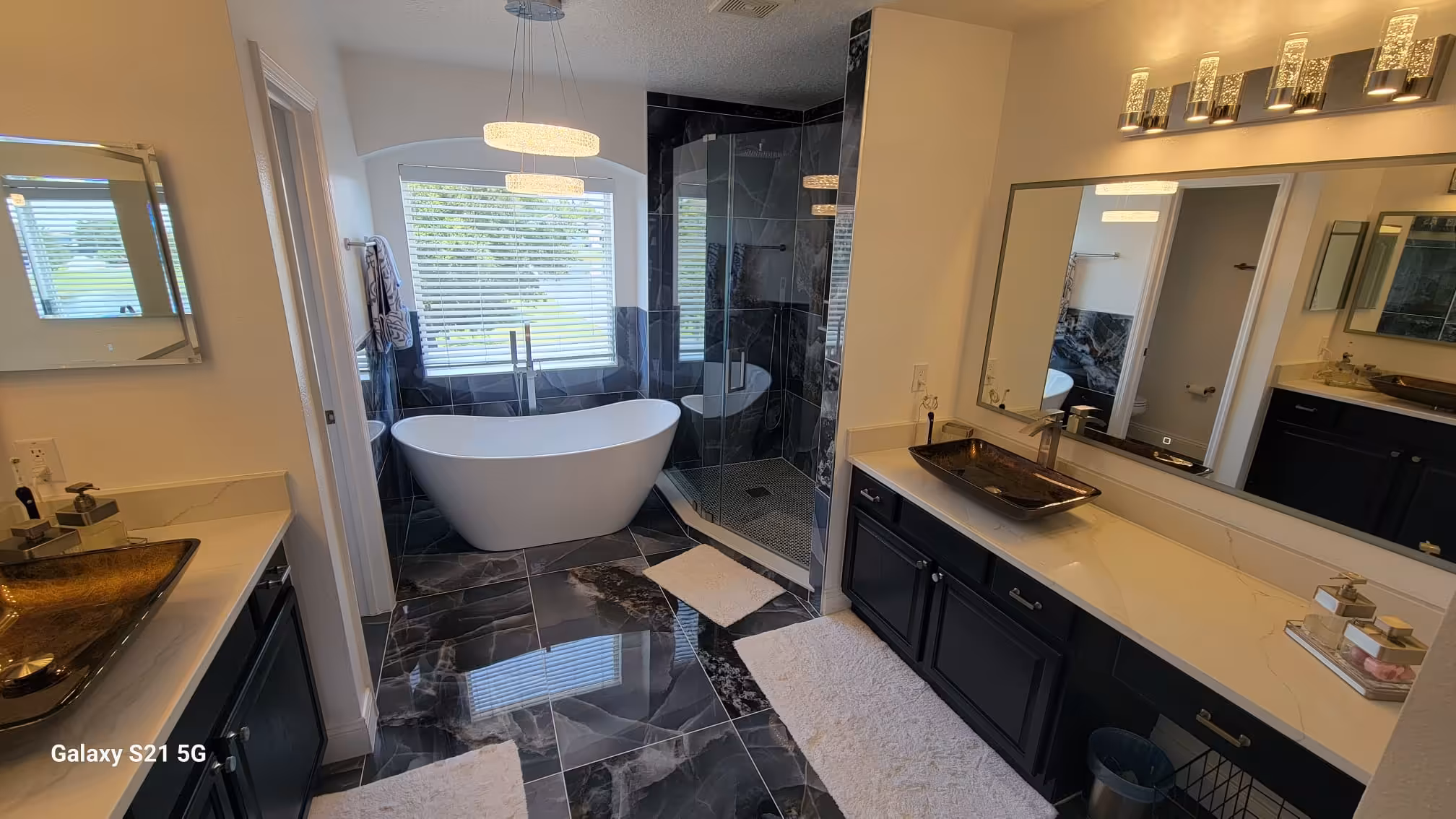 Modern bathroom remodel with walk-in shower and tile work