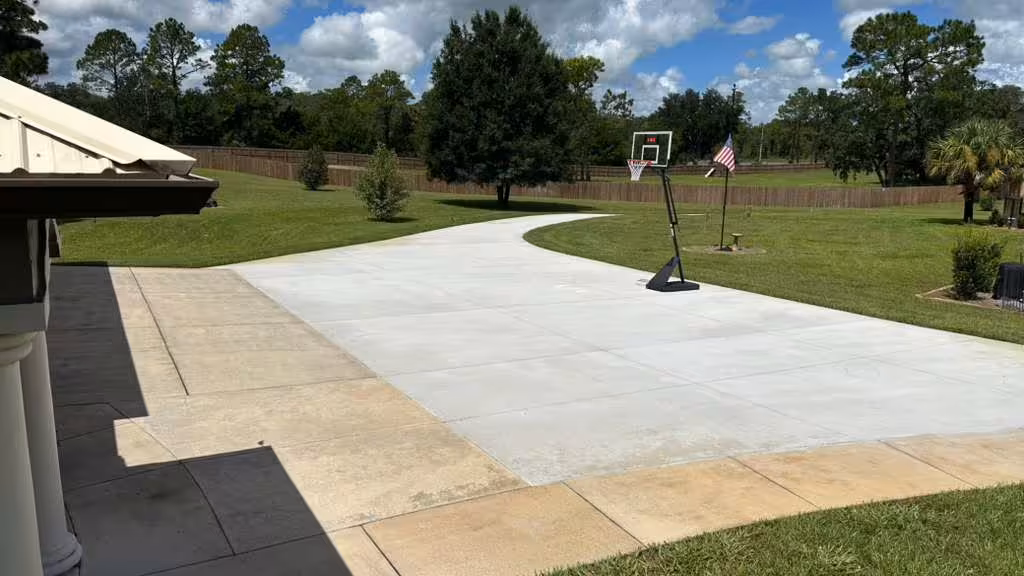 Concrete pad and curved driveway